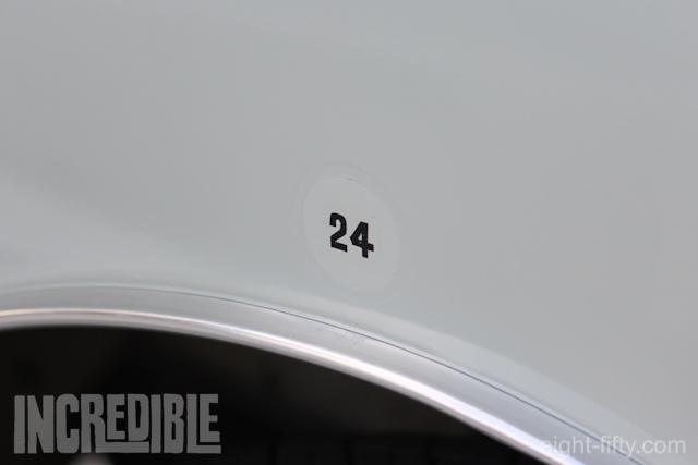 The original painted number was masked off and retained when the car was resprayed.
