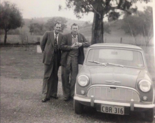 A 1960 car with BMC employees standing alongside (image: via T. Rusten)